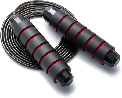 Displays the jump rope product clearly on a white background to show the ergonomic foam grip handles with red accent rings and the coiled cable design, helping shoppers understand the product's…