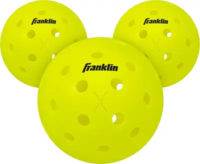Shows three identical Franklin-branded pickleballs in bright yellow, clearly displaying the core product available for purchase.