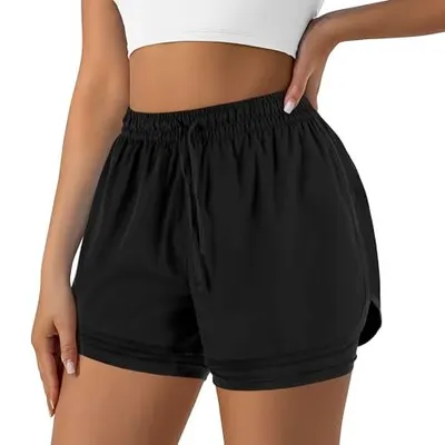 Shows a person wearing the athletic shorts to demonstrate fit, scale, and how the product looks when worn, helping shoppers visualize the product on themselves.