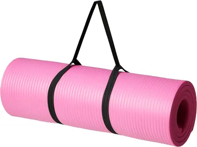 Shows the core product clearly on a white background to communicate what the shopper is purchasing: a pink yoga mat with an included black carrying strap for portability. Demonstrates that the…