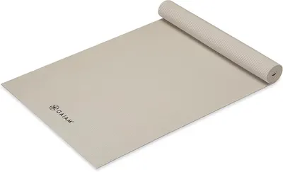 Shows the core yoga mat product in a partially rolled state to communicate its texture, material quality, and rollable portability feature. Demonstrates the mat's rollable functionality, showing how…