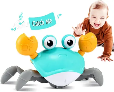Shows a baby actively playing with and reaching for the crab toy to demonstrate its appeal and engagement for young children. Uses graphic overlays including…