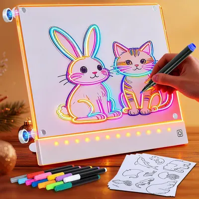 Demonstrates the product actively in use with illuminated LED lights showing how the drawing board functions as a backlit tracing and coloring tool for…