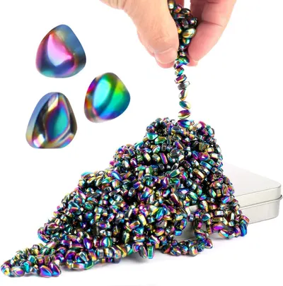 Showcases the product's vibrant iridescent rainbow coating and the variety of bead shapes included, communicating visual appeal and creative possibilities for…