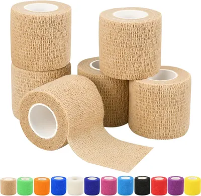 Shows the core product clearly - multiple rolls of self-adhesive cohesive bandage tape in beige/tan color, demonstrating what the buyer receives in the…