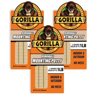 Shows the core product packaging for Gorilla Removable Mounting Putty, communicating the brand, product type, and key features like pre-cut squares and…