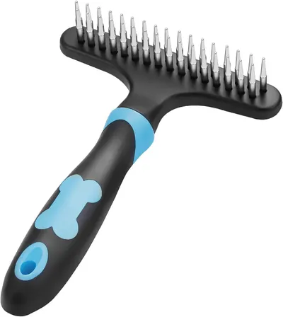 Shows the core pet grooming brush with its distinctive curved head design and ergonomic handle to communicate the product's form and functionality. The blue decorative elements on the handle appear…
