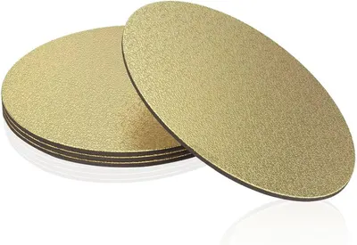 Shows the core product as a stack of gold cake boards to communicate the multi-pack quantity included in the purchase.