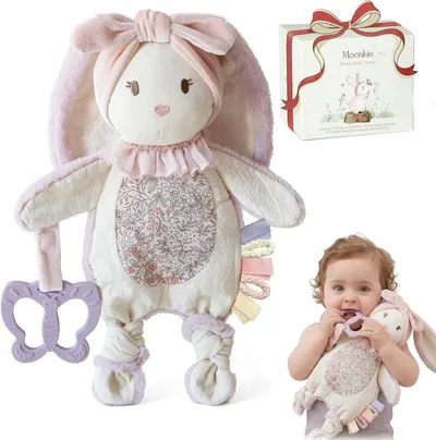 Displays the core product—a soft plush bunny toy with sensory ribbons and teething features—to show parents what they are purchasing for their baby. Shows the included butterfly teether accessory…
