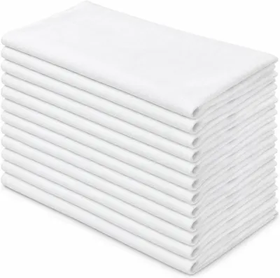 Shows a large stack of white towels to communicate the multi-pack quantity and value, reassuring buyers they are getting multiple units in one purchase.