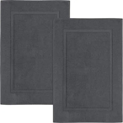 Shows the core product clearly - two identical bath mats in dark gray color, allowing shoppers to see the texture, border design, and that this is a 2-pack set.