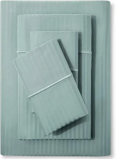 Displays the full sheet set including fitted sheet, flat sheet, and pillowcase(s) to show the buyer exactly what is included in the purchase and the…