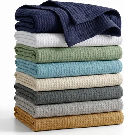 Displays the core product—waffle weave blankets or towels—in a clean, catalog-style presentation to show the texture and quality of the fabric. Shows the…