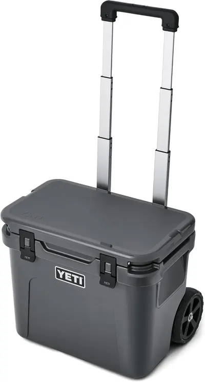 Displays the core product clearly on a white background to show the cooler's design, wheels, and telescoping handle feature for easy transport. Demonstrates…