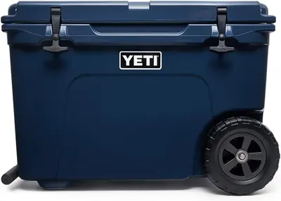 Displays the core product, a YETI wheeled cooler, in a clean catalog style to show its design, branding, and key features like the wheels and latches.…