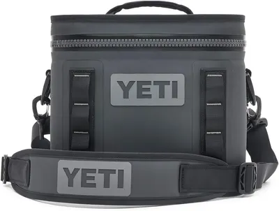 Displays the core YETI cooler bag product clearly on a white background, allowing shoppers to see the design, branding, carrying handle, shoulder strap, and…