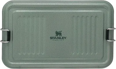 Displays the Stanley cooler lid prominently to showcase the brand, durable construction, and secure latch system that keeps contents cold and protected.