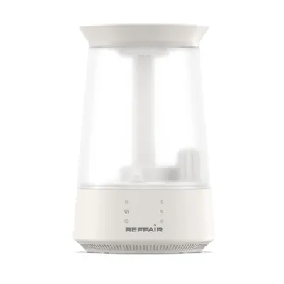 Shows the core humidifier on a clean white background so shoppers can see its design, transparent tank, and control panel clearly. A faint shadow grounds the humidifier on the white backdrop, giving…