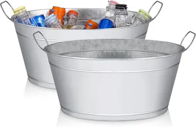 Shows the two galvanized metal tubs with handles as the core sellable set on a clean catalog view so shoppers can see the size and shape. Shows one tub filled…
