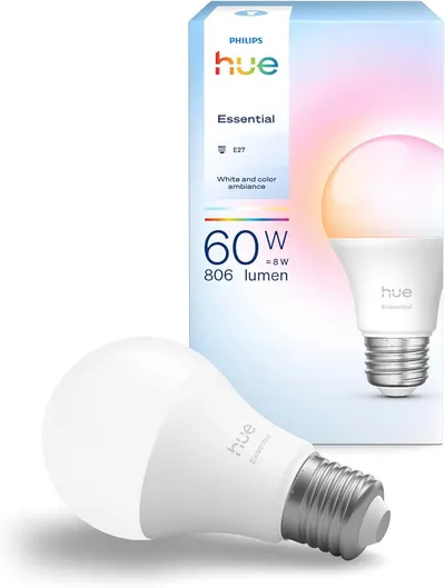 Shows the core Philips Hue Essential smart bulb clearly so shoppers can confirm the E27 base and brightness level. Shows the retail box alongside the bulb so buyers recognize the official packaging…