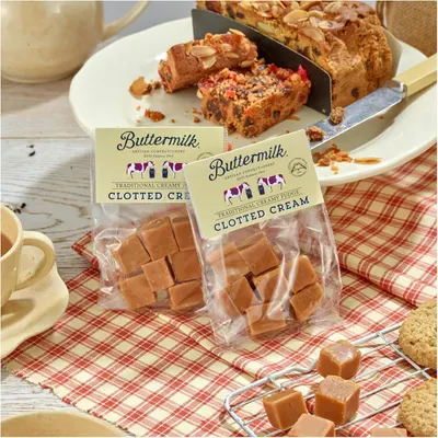 Shows the different components included when purchasing the product, including clotted cream fudge and packages of clotted cream.