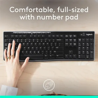 Highlights the keyboard's full-size layout and dedicated number pad for comfortable typing and data entry.