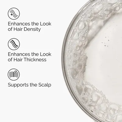 Highlights multiple benefits of the product for improving hair appearance and scalp health.