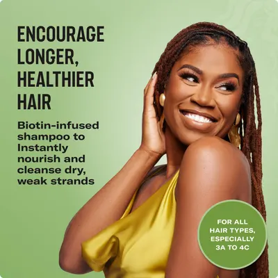 Highlights the key benefit of the biotin-infused shampoo instantly nourishing and cleansing dry, weak hair strands for longer, healthier hair.