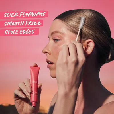 Highlights the product's ability to tame flyaways, smooth frizz, and style hair edges for a polished look.