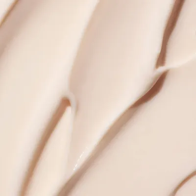 Showcases the soft, natural texture and organic material of the product in a lifestyle context.
