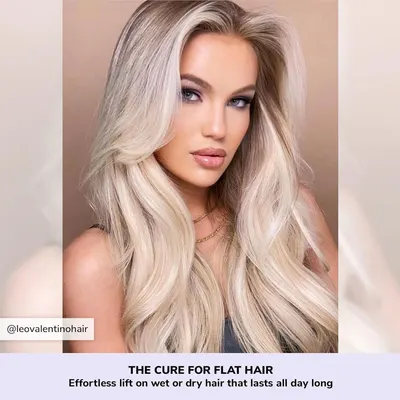 Highlights the product's ability to provide effortless volume and lift that lasts all day on both wet and dry hair.