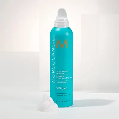 Highlights the product's volumizing and full body benefits for fine or medium hair.