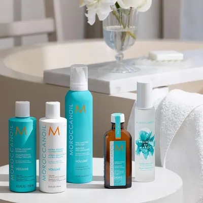 Shows the various hair care products included in the Moroccan Oil line, allowing customers to see the full range of items they would receive.