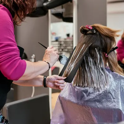 Shows the product being used in a real-world setting by a customer, conveying authenticity and building trust.