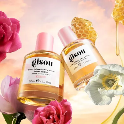 Highlights the key feature of the hair perfume being honey infused and floral scented to entice customers with its unique fragrance.