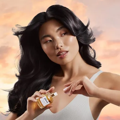 Highlights the product's fragrance and promotes its use for enhancing beauty and confidence.