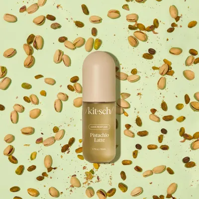 Highlights the pistachio latte scent of the hair perfume product.