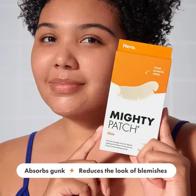 Highlights two key benefits of the Mighty Patch product: its ability to absorb impurities and reduce the appearance of blemishes.