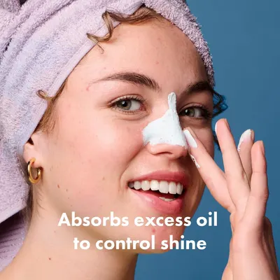 Demonstrates the product's ability to absorb excess oil from the skin, helping to control shine and improve complexion.