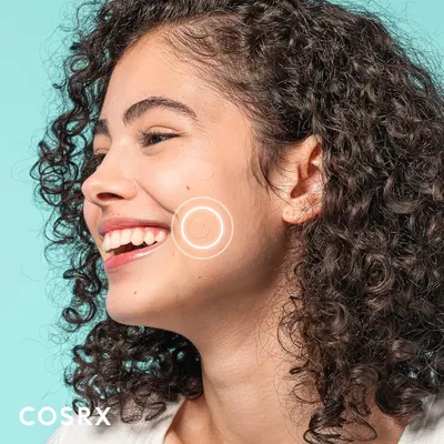 Highlights the product's ability to provide clear, radiant skin by focusing on a smiling woman with smooth, glowing complexion.