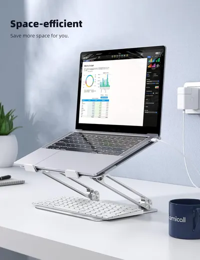 Highlights the product's ability to save desk space by elevating the laptop, allowing for a more organized workspace.