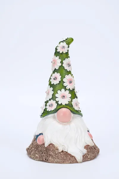 Showcases a decorative garden gnome with a spring-themed design to appeal to customers looking for seasonal outdoor decor.