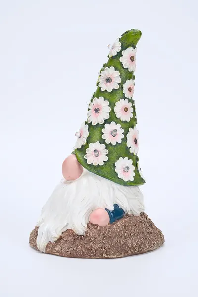 Showcases a spring-themed garden gnome figurine to appeal to customers looking for seasonal decorative items.