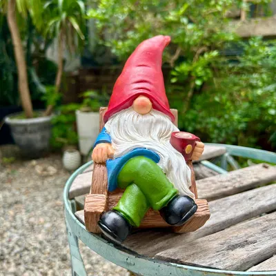 Shows the product in a realistic outdoor setting to demonstrate how it can enhance garden aesthetics and create a whimsical atmosphere.