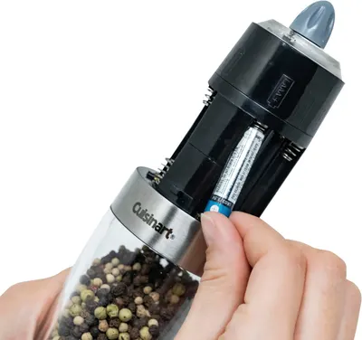 Demonstrates how to properly insert batteries into the product, ensuring customers can easily set up and use the device.