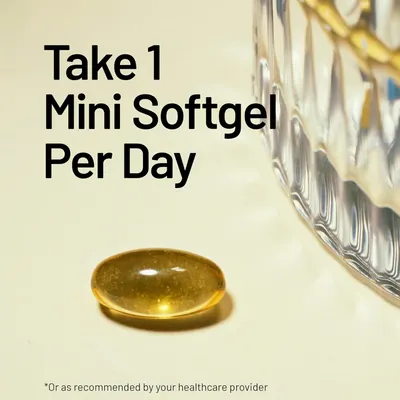 Communicates the simple dosage instructions of taking one mini softgel per day, emphasizing ease of use.