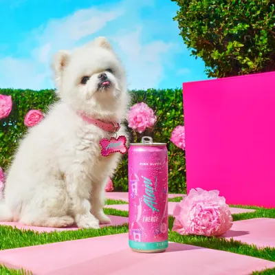 Shows the product in a fun, colorful environment to associate it with a playful, energetic lifestyle. Highlights the product's vibrant pink color and associates it with a cute, energetic image to…