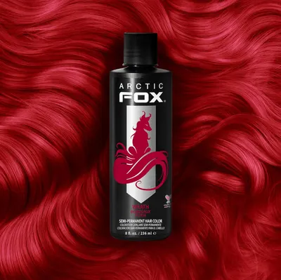 Showcases the intense red hair color result achievable with the product, appealing to customers seeking bold hair transformations.