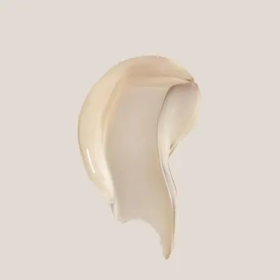 Showcases the product's creamy, luxurious consistency to emphasize its quality and ease of application.