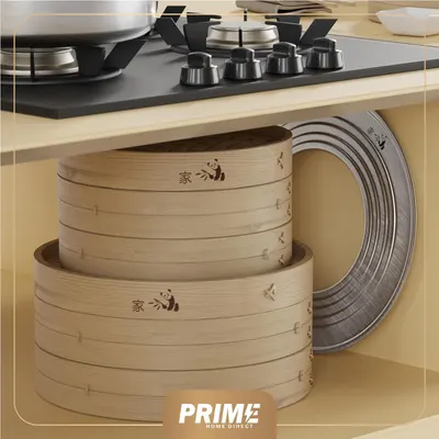 Shows the complete set of bamboo steamers that come with the product, demonstrating the variety of sizes included. Highlights how the steamers can be neatly…